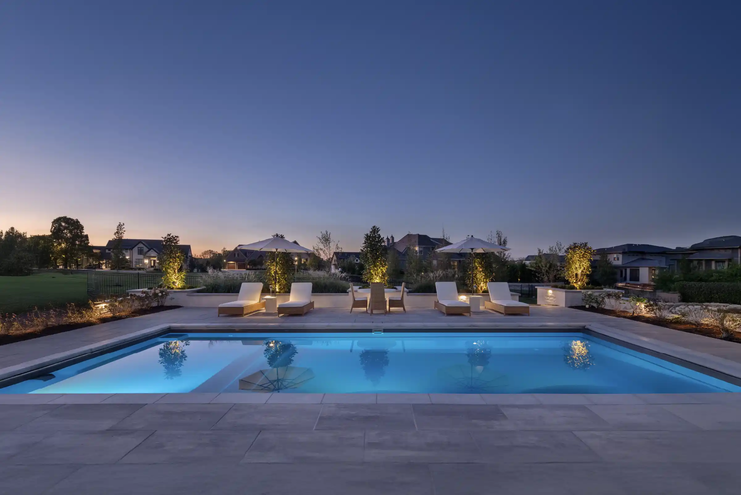 Nashville fiberglass pool and outdoor living space at night